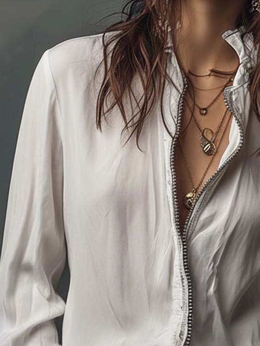 Sheila | Blusa con cremallera y puños de volante