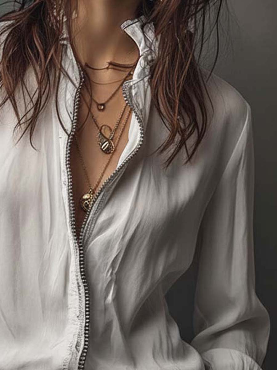 Sheila | Blusa con cremallera y puños de volante