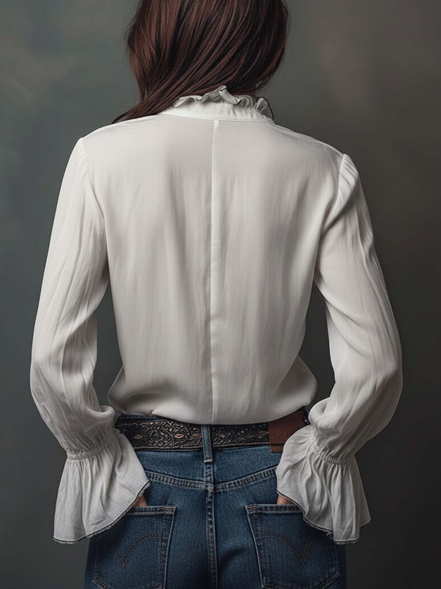 Sheila | Blusa con cremallera y puños de volante