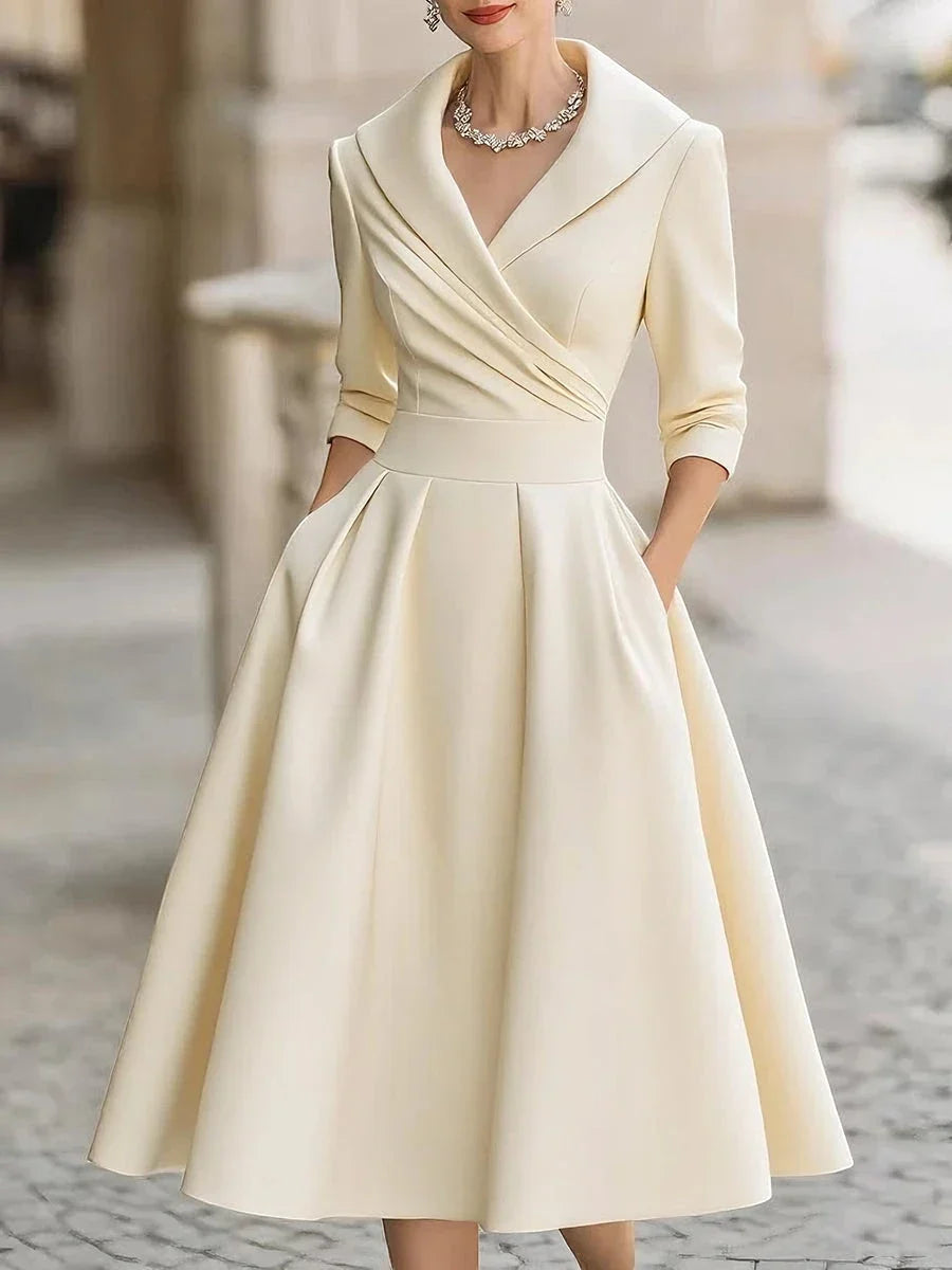 Ariadna: Vestido midi de invitada con cuello solapa en beige
