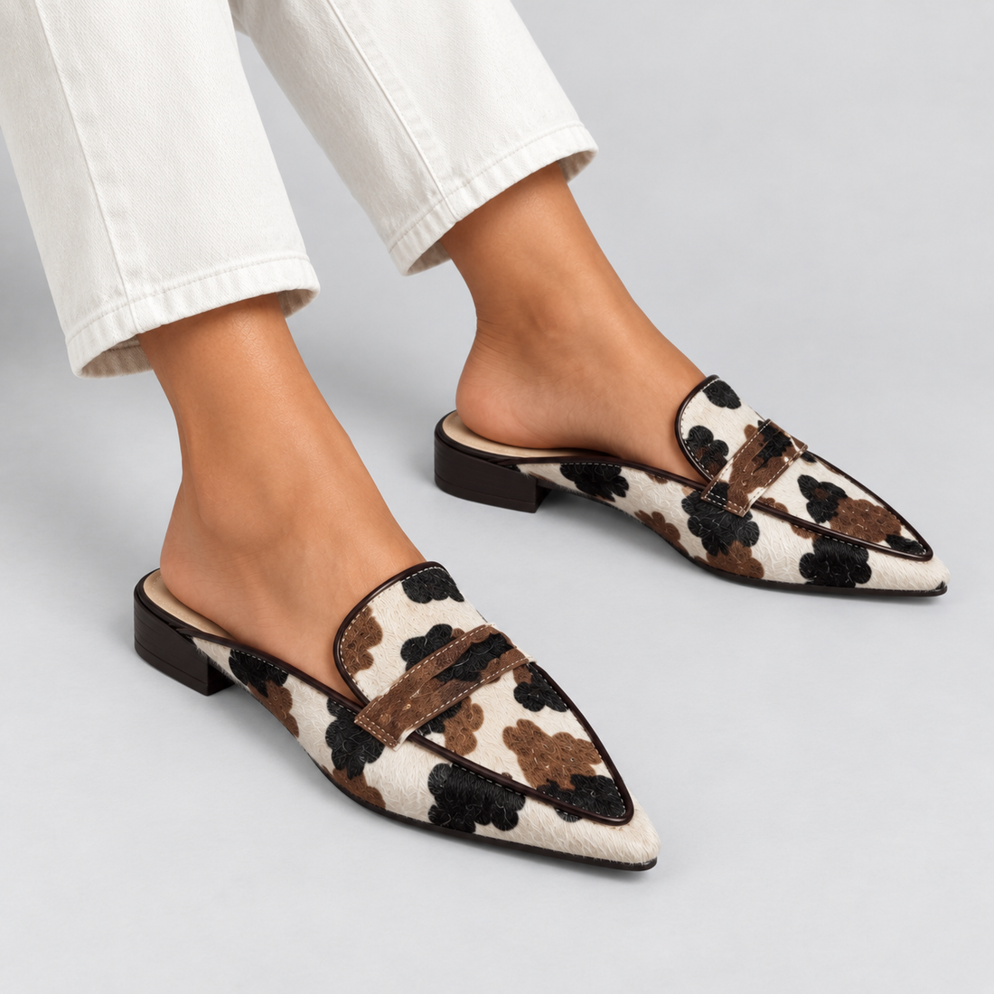 Desirée | Mocasines destalonados con estampado de vaca