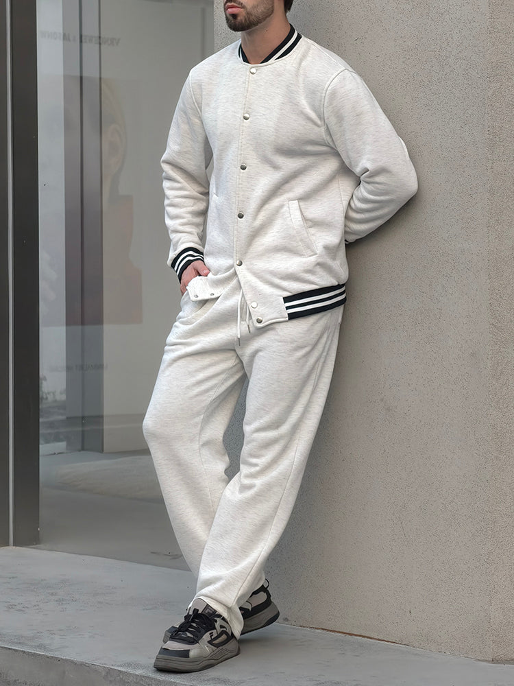Marcos: Conjunto de chaqueta y pantalón con ribetes de rayas