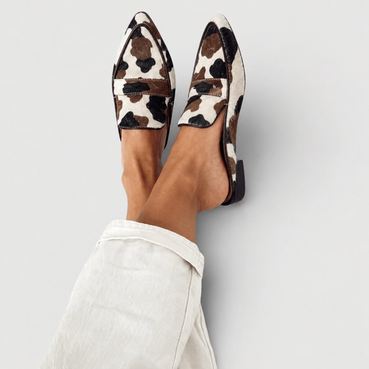 Desirée | Mocasines destalonados con estampado de vaca