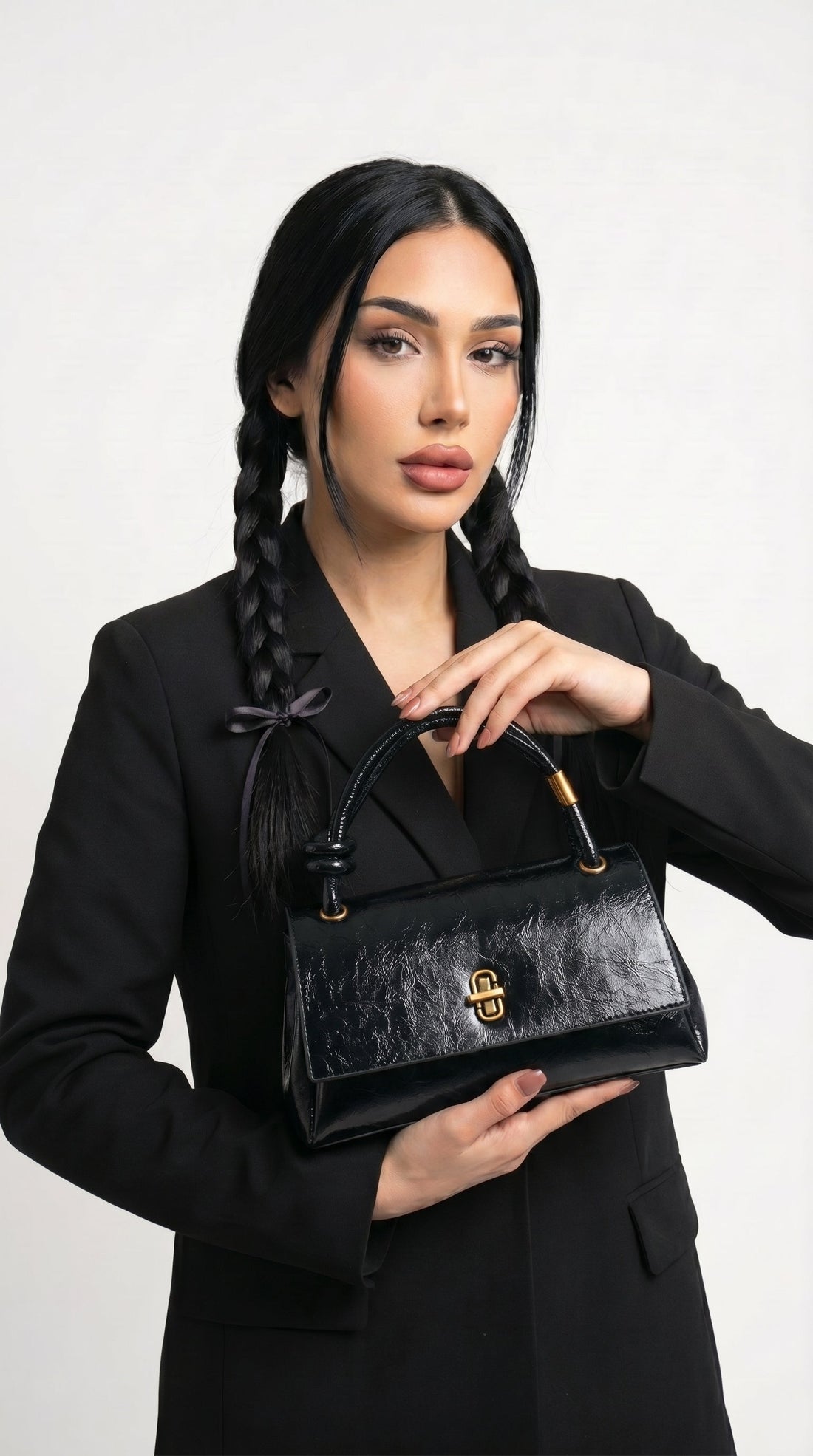 Ana Belén | Bolso de mano con nudo en el asa