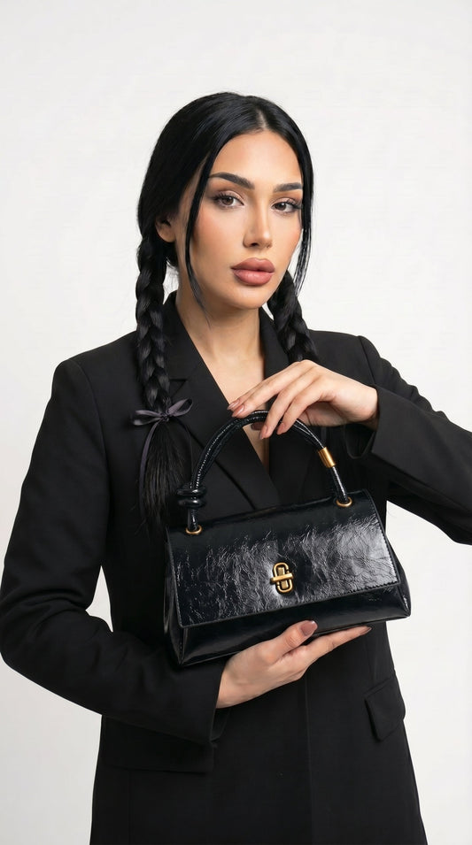 Ana Belén | Bolso de mano con nudo en el asa
